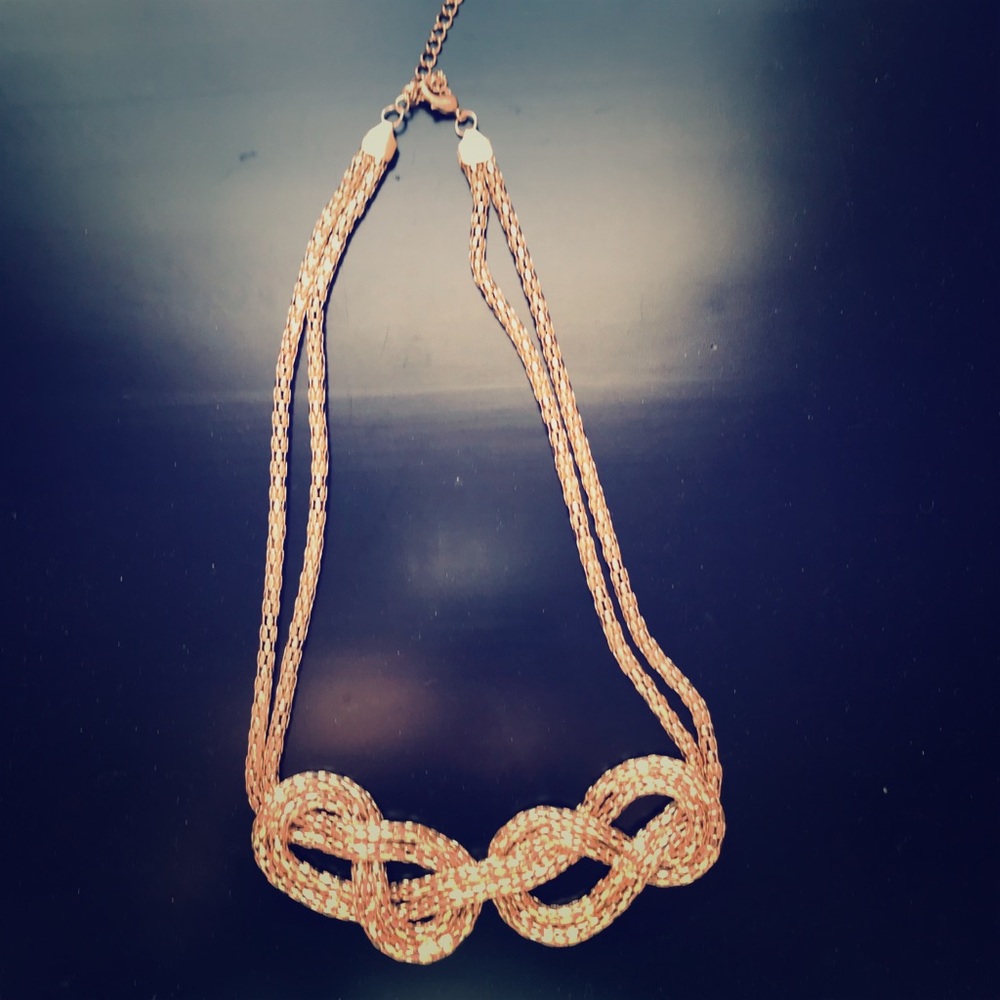 NWT Gold chain necklace with knot.